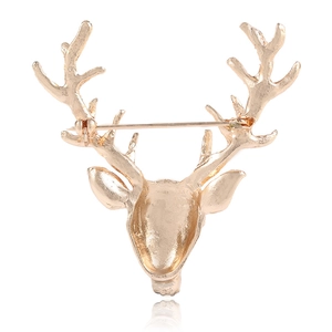 Detailed back view of a golden alloy deer brooch with secure pin clasp and antler texture