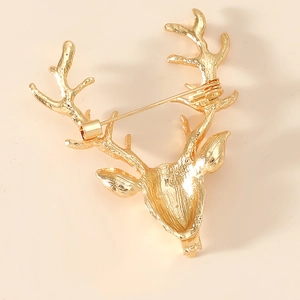 Detailed back view of gold alloy deer brooch featuring the secure safety pin clasp