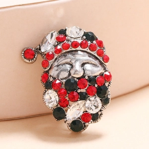 Vintage silver Santa Claus brooch with sparkling red and white rhinestones and festive design