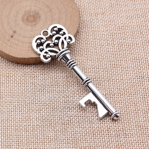 Vintage 77x27mm silver alloy hollow key pendant and bottle opener for DIY projects