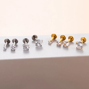 8-piece set of silver and gold stainless steel labret studs with round clear zircons