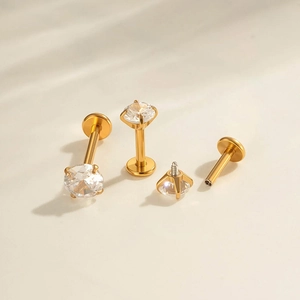 Golden stainless steel labret studs with round zircon and internal thread design
