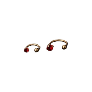 Golden stainless steel horseshoe circular barbell with red zircon gemstone settings