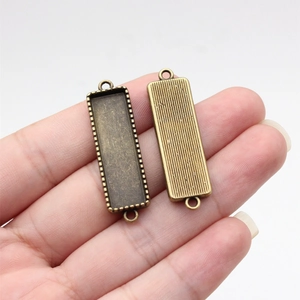 Antique bronze rectangle cabochon base tray with double hanging loops for DIY jewelry