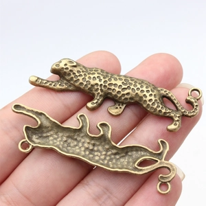 Antique bronze leopard connector charms with embossed spotted texture and double rings