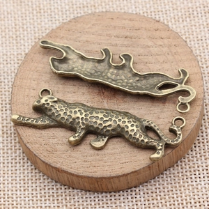 57x19mm bronze leopard charms for jewelry making featuring realistic textured leopard spots