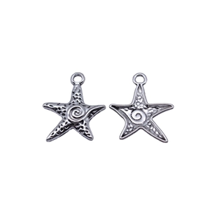 Pair of vintage silver swirl starfish pendants for DIY jewelry making and crafting