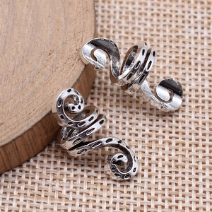 Antique silver spiral hair braid beads with dotted texture and vintage metal finish