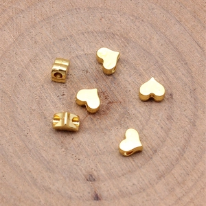 Golden heart-shaped zinc alloy beads for DIY jewelry with small side holes