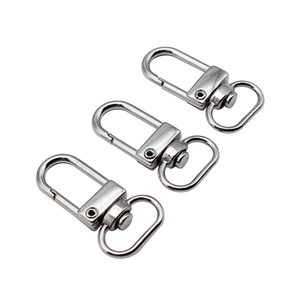 Three bright silver swivel lobster clasps for bags and keychains on a white background
