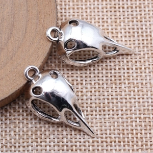 Antique silver bird skull pendant in hollow alloy design for DIY jewelry making