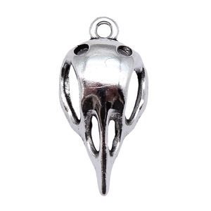 Antique silver bird skull pendant with vintage metal texture and top ring loop
