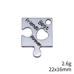 Silver puzzle piece charm engraved with Best Friends Forever text, 22x16mm size