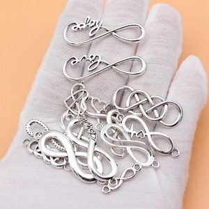 Set de colgantes de símbolo de infinito en plata antigua y corazones para joyería DIY
