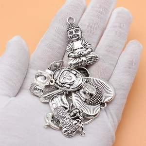 Set of 15 antique silver Buddha pendants with diverse spiritual designs for jewelry making