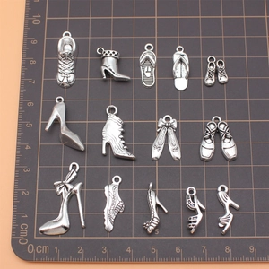 Variety of mini metal shoe charms including sneakers and boots for DIY jewelry making
