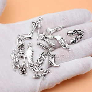 Set of 14 vintage silver shoe pendants including boots and heels for DIY jewelry making