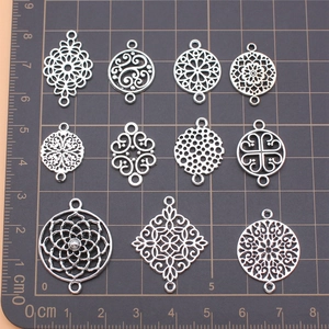 Set of 11 antique silver filigree flower pendants and geometric connectors for DIY jewelry