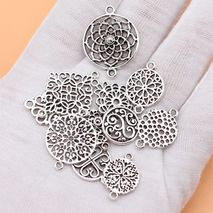 Set of 11 antique silver flower pendant connectors for DIY vintage jewelry making