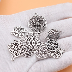 Set of 11 vintage silver flower pendants and connectors for DIY jewelry making
