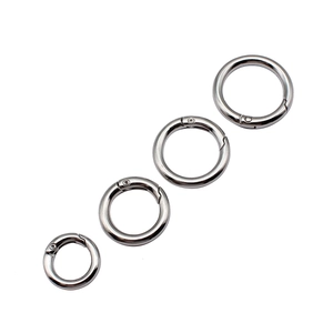 Set of four silver metal spring O-rings in varying sizes for DIY keychains and bags
