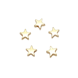 Cinque perline metalliche a forma di stella dorata per creazione gioielli DIY