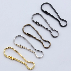 Set of teardrop-shaped metal snap hooks in five metallic finishes on a clean background