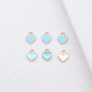 6-piece light blue heart enamel pendants with gold finish and hanging loops for DIY jewelry