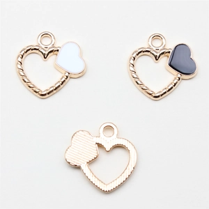 Three gold heart alloy pendants with openwork lace and enamel drip for jewelry making