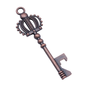 Vintage red copper crown key bottle opener pendant with ornate filigree design