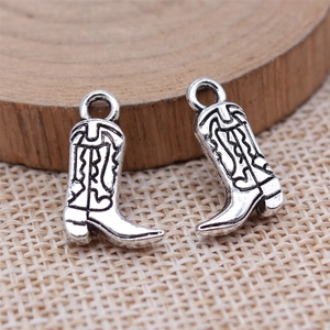 Vintage silver cowboy boot charms made of alloy for DIY jewelry with western floral textures