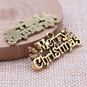Vintage gold Merry Christmas pendants with festive tree charms for DIY holiday jewelry making