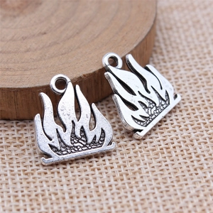 Pair of antique silver flame pendants with black details for DIY jewelry making