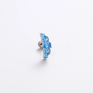 Titanium steel cartilage stud earring with blue zircon gemstones in a curved arrangement