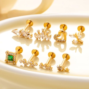 Set de 8 labrets de titanio dorado con circonitas y formas de corona elegantes para piercings