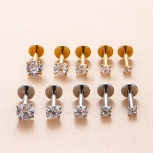 Flat back surgical steel labret studs with round cubic zirconia in gold and silver set