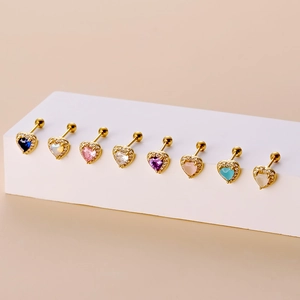 Set of eight colorful heart zirconia cartilage studs with gold plating and screw balls