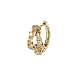 Elegant gold horseshoe earring with micro-set zircons on a white background
