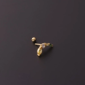 Macro shot of titanium steel fruit earring with colorful marquise zircons and ball back