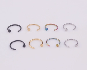Set of eight 316L stainless steel C-shaped nose rings in black gold silver and rainbow