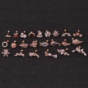 Set de 21 pendientes de oro rosa con circonitas y perlas en variadas formas modernas