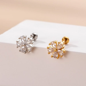 Macro di orecchini a fiore argento e oro con zircone a goccia e chiusura posteriore a vite