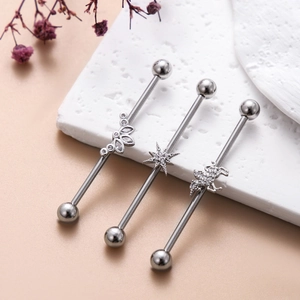 Ensemble de trois piercings industriels avec feuilles de cristal, étoile et licorne