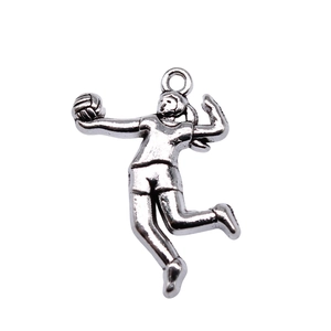Polished silver volleyball player pendant showing female athlete jumping to spike a ball