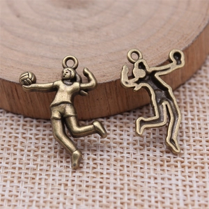Vintage bronze volleyball player silhouette charms for DIY jewelry and sports accessories