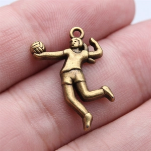 Bronze volleyball player pendant showing an athlete spiking, sporty retro jewelry accessory