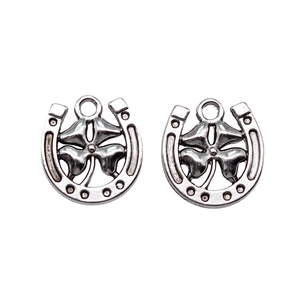 Antique silver horseshoe and four-leaf clover charms for DIY jewelry making