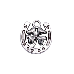 Antique silver horseshoe and four-leaf clover lucky charm pendant for jewelry making