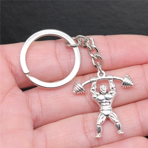 Porte-clés haltérophile argenté avec pendentif haltère en métal de haute qualité