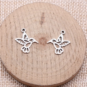 Set of two antique silver hummingbird charms with hollow design for DIY jewelry making